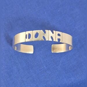 Vintage Leonore Doskow Sterling Silver Cutout Name Cuff Bracelet "Donna"